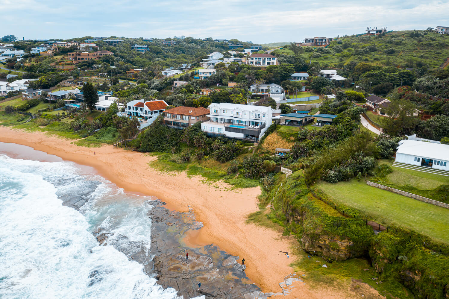 aeriel view of units with ocean